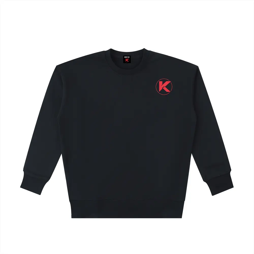 The Reign heavyweight crewneck sweatshirt in black, front with red K chest logo
